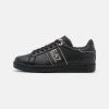 EA7 Emporio Armani UNISEX Baskets Basses Triple Black/gold