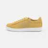 EA7 Emporio Armani UNISEX Baskets Basses Gold